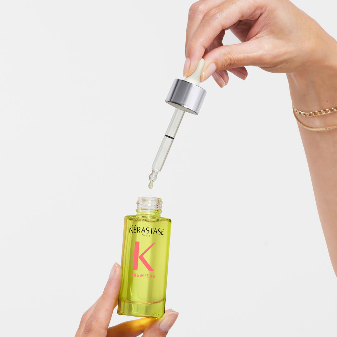 kerastase-premiere-huile-gloss-shine-repairing-hair-oil-in-hand.jpg