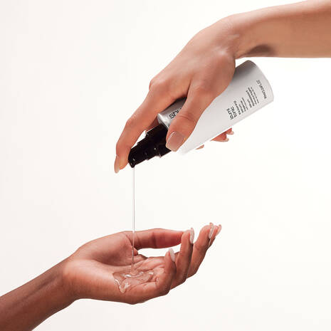 shu-uemura-art-of-hair-izumi-tonic-hair-thickening-rice-water-serum-in-hand.jpg