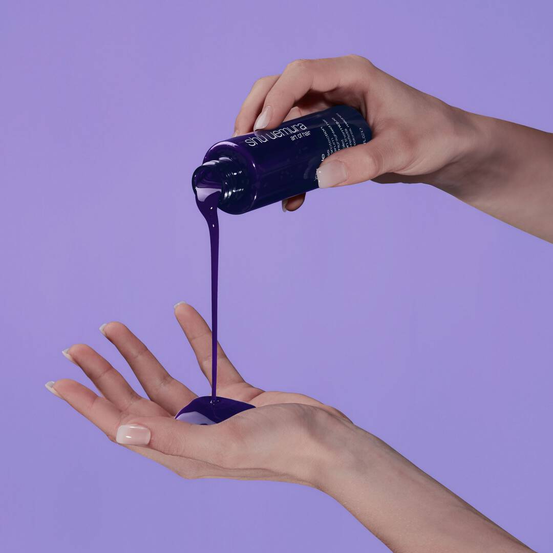 shu-uemura-art-of-hair-yubi-blonde-anti-brass-purple-heat-protecting-hair-serum-in-hand.jpg